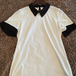 A.U.W: White W/ Black collar & sleeve lining